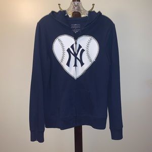 A soft Yankee sweatshirt worn once or twice.